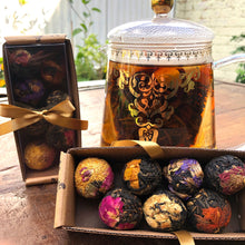 Load image into Gallery viewer, 7 pack of Artisan Flowering Black Pu'erh Tea